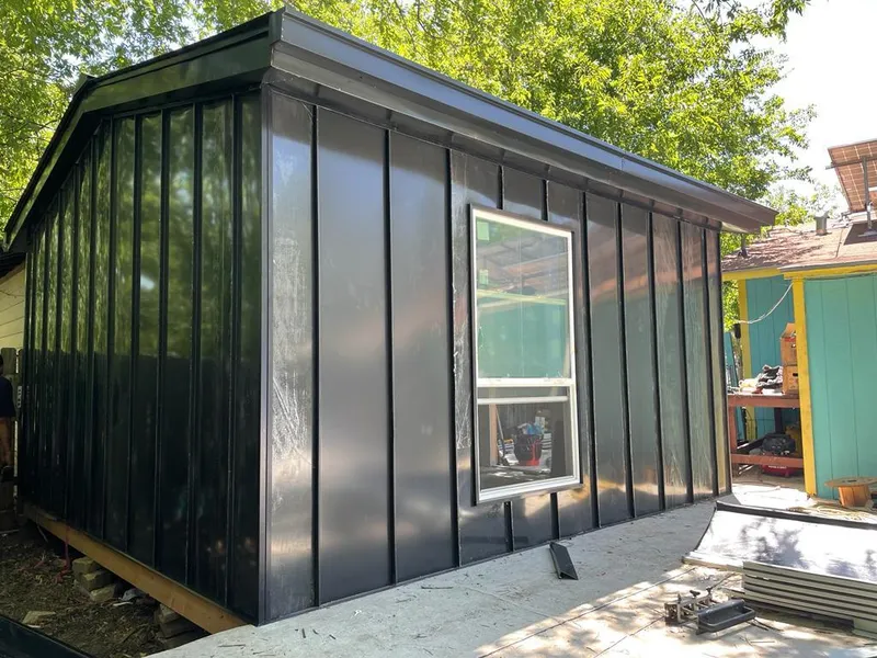 Black standing seam metal wall panels for Metal Roof Installation in Wakefield