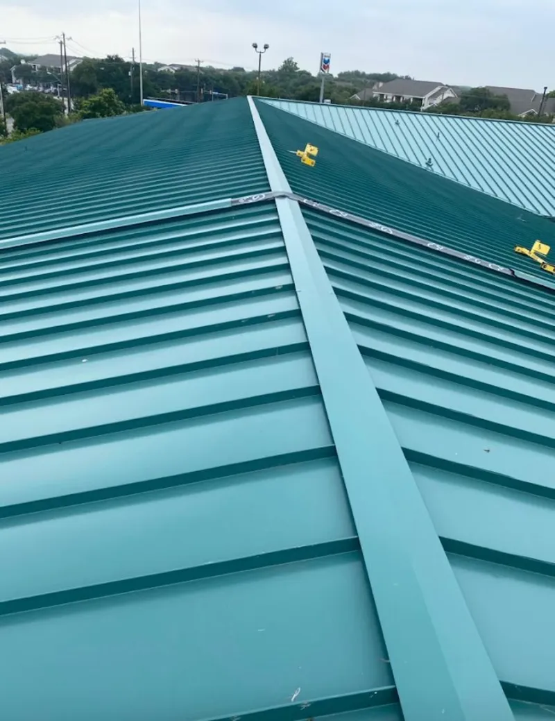 Green commercial metal roof ridge and valley for Metal Roof Repair in Wakefield