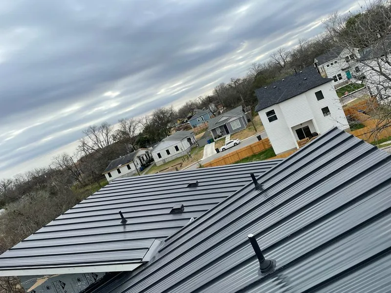 Standing seam metal roof panels with vents for Skylight Repair in Wakefield